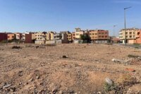 صورة توضيحية لأوراق قضائية أو وثائق ضريبية مع خريطة المغرب