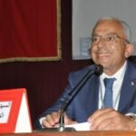 صورة لمبنى يرمز لوكالة تنفيذ المشاريع بجهة الدار البيضاء-سطات، مع إشارة إلى الجدل حول التعيينات.