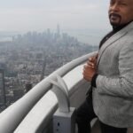 Daymond John's Longevity Playbook: From Shark Tank to Biohacking Master 6 Daymond John engaging in a biohacking activity like a cold plunge or red light therapy