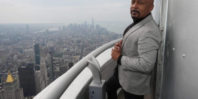Daymond John engaging in a biohacking activity like a cold plunge or red light therapy