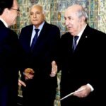 Le président algérien Abdelmadjid Tebboune serrant la main du ministre français de l'Intérieur Laurent Nuñez, un signe de rapprochement diplomatique.