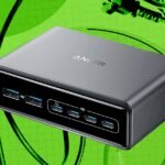 A neatly organized desk with cables managed and hidden, showcasing a clean and efficient workspace.