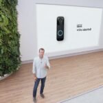 The Unseen Watchman: How Doorbell Cameras Could Be Key to Solving High-Profile Crimes 2 Ring CEO Jamie Siminoff discussing the role of doorbell cameras in crime investigations, with a blurred image of a home security camera in the background.