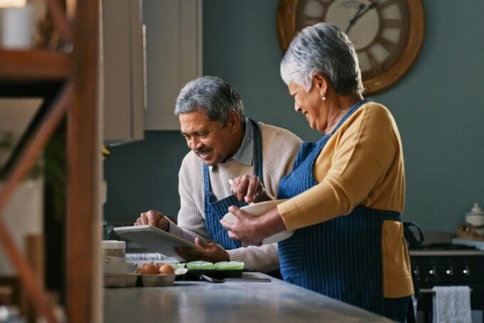 A family collaborating on a small business project at home, symbolizing teamwork and entrepreneurship.