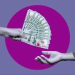 From Fortune to Future: Mastering Generational Wealth Transfer for High-Net-Worth Families 6 A multi-generational family discussing financial documents around a table, symbolizing wealth transfer and legacy planning.