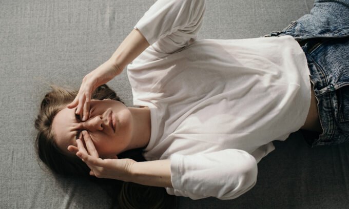 Illustration of the gut-brain connection, possibly showing bacteria influencing brain activity or a person feeling motivated to exercise.