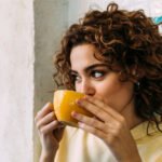 Hibiscus Tea: Nature's Collagen Booster for Vibrant, Youthful Skin 8 Vibrant hibiscus tea in a mug, symbolizing natural skin health and anti-aging benefits.