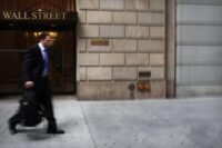 Attendees at the iConnections conference in Miami discussing digital assets.