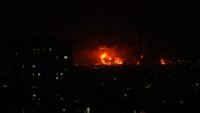 Flames rise from an oil storage facility in Tehran during US-Israel military campaign on March 7, 2026.