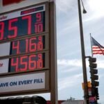 A gas pump displaying rising fuel prices with a backdrop of geopolitical tension, symbolizing the economic impact of the Iran war.