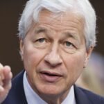 Jamie Dimon's Golden Rule: The Silent Strategy That Forged a Banking Titan 4 JPMorgan Chase CEO Jamie Dimon emphasizing the importance of listening and adding value in professional settings.