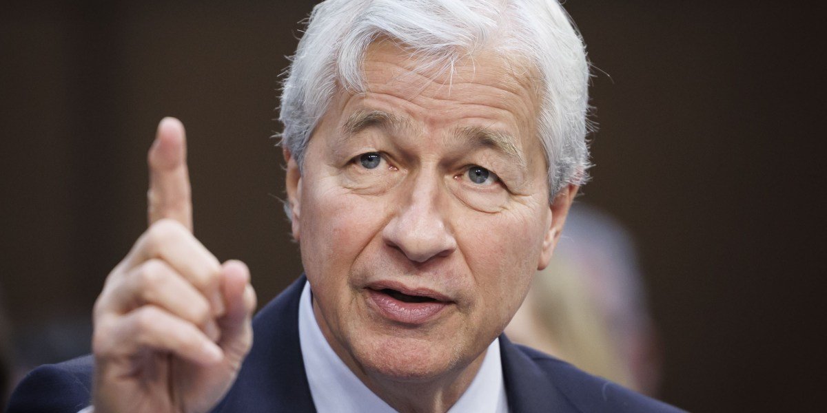Jamie Dimon's Golden Rule: The Silent Strategy That Forged a Banking Titan 3 JPMorgan Chase CEO Jamie Dimon emphasizing the importance of listening and adding value in professional settings.