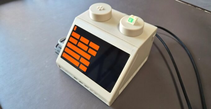 The M2x2 super-sized Lego computer brick desktop PC with a Mac Mini inside, featuring a touchscreen and functional studs.