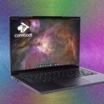 A sleek, modern laptop displaying a Linux desktop environment.