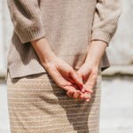 Beyond the Ache: Research Reveals the Most Effective Movements for Low Back Pain Relief 6 An individual performing a gentle exercise, possibly Tai Chi or yoga, to relieve low back pain.