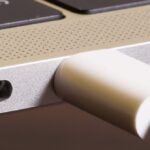 A close-up of a MacBook's battery icon showing an 80% charge, symbolizing optimal battery health.