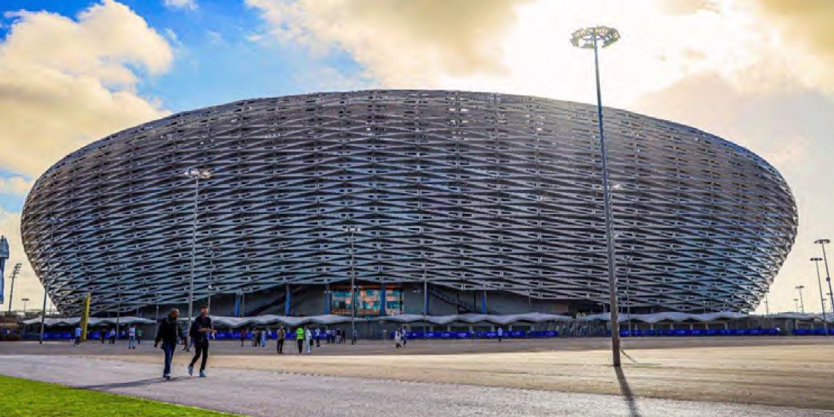 Vue aérienne d'un stade moderne marocain, symbolisant l'ambition du pays pour la Coupe du Monde 2030.