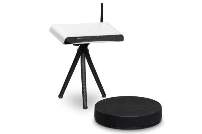 Matter and Form Three 3D Scanner with a Lego minifigure on its turntable, ready for scanning.