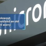Micron's Stellar Earnings Spark Wall Street's Oldest Chip Industry Fear 4 Micron Technology logo displayed on a computer chip, symbolizing the semiconductor industry and financial market concerns.
