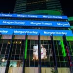 Morgan Stanley headquarters building with company logo against a city skyline.