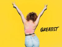 A person smiling and exercising, symbolizing successful weight loss and a healthy lifestyle with Noom GLP-1Rx.