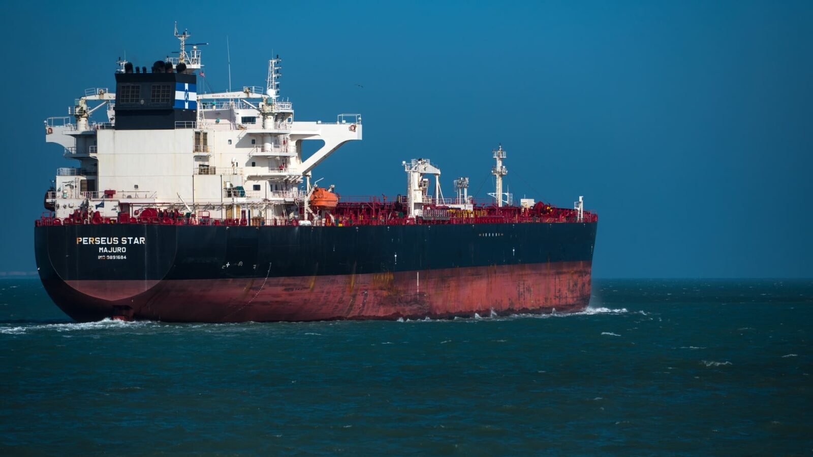 Oil Markets Brace for Volatility as Iran Tensions Escalate: Crude Set to Surge Past $70 3 The Perseus Star crude oil tanker departing the Port of Corpus Christi, Texas, amidst global market uncertainty.