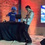 Attendees at ClawCon NYC wearing lobster headbands and mingling, celebrating the OpenClaw AI platform.