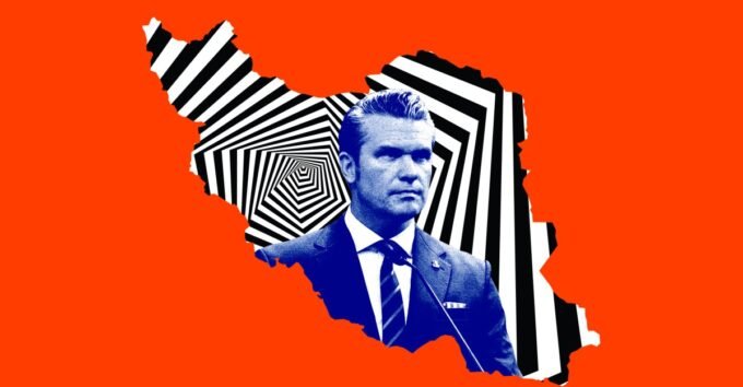 Defense Secretary Pete Hegseth at a Pentagon press briefing, addressing a room of journalists with a stern expression.