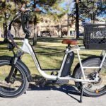 Rad Power Bikes logo with an electric bicycle in the background, symbolizing its new ownership and future.