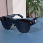RayNeo Air 4 Pro: Your Personal OLED Cinema, Anywhere 4 RayNeo Air 4 Pro AR/XR smart glasses unboxed and in use, showcasing their sleek design and virtual screen capabilities.