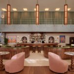 The striking mid-century facade of the Municipal Grand Hotel in Savannah, showcasing its unique blend of tropical modernist and Nordic design elements.