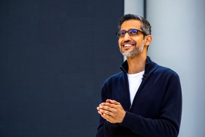Sundar Pichai, CEO of Google and Alphabet, with a backdrop representing technology and finance.