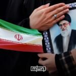 Iranian flag alongside hands holding a portrait of Supreme Leader Ali Khamenei, symbolizing the regime's authoritarian rule and its impact on the nation.