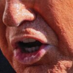 Donald Trump speaking at a podium, with an American flag in the background, overlaid with an image of an Iranian flag or a map of the Middle East.