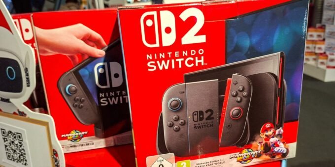 A stack of US dollar bills with a gavel and a small American flag, symbolizing legal and financial disputes over trade tariffs.