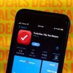 A tax expert assisting a client virtually with TurboTax Full Service, highlighting ease and professionalism.