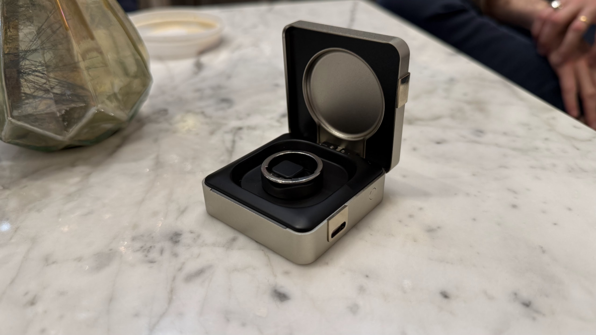 The Ultrahuman Ring Pro: A Smart Ring with an Even Smarter Charging Case 3 The Ultrahuman Ring Pro smart ring magnetically attached to its innovative, feature-filled charging case.