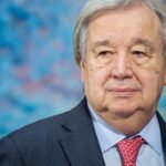Representatives from the United States, Israel, and Iran engage in a tense debate during an emergency UN Security Council meeting, with the UN logo visible in the background.