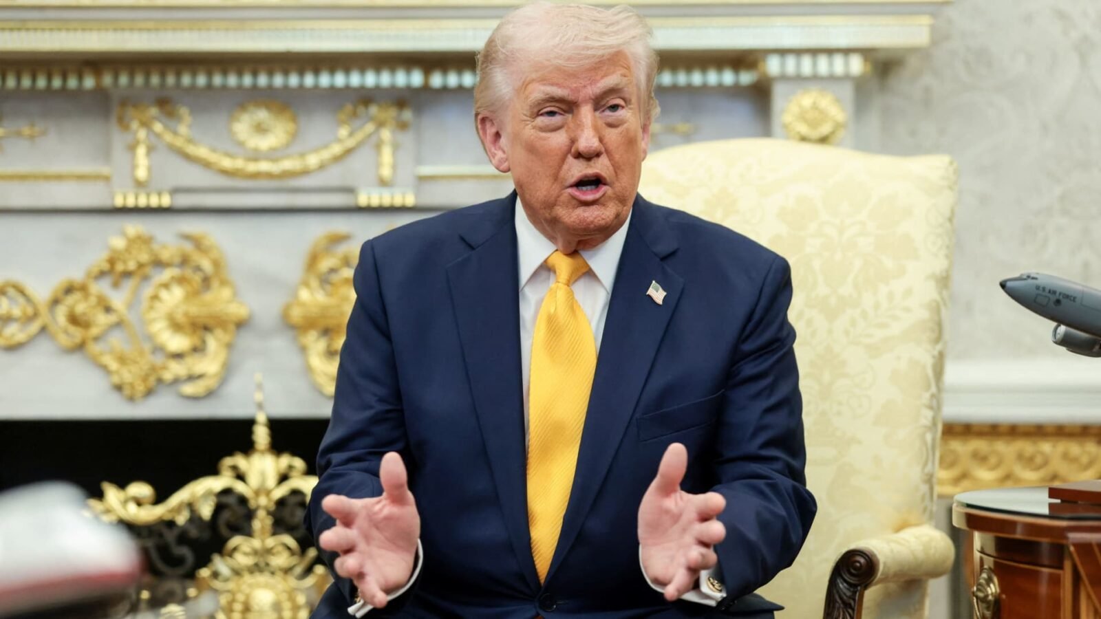 U.S. President Donald Trump in the Oval Office, discussing Middle East diplomacy.