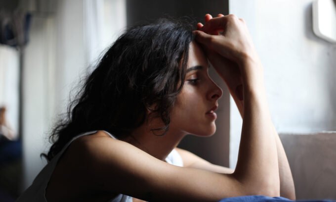 Illustration depicting the link between sunlight, vitamin D, and a person's mood or mental well-being.