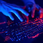 Diagram illustrating the multi-stage VOID#GEIST malware attack chain with batch scripts, Python runtime, and RAT payloads.