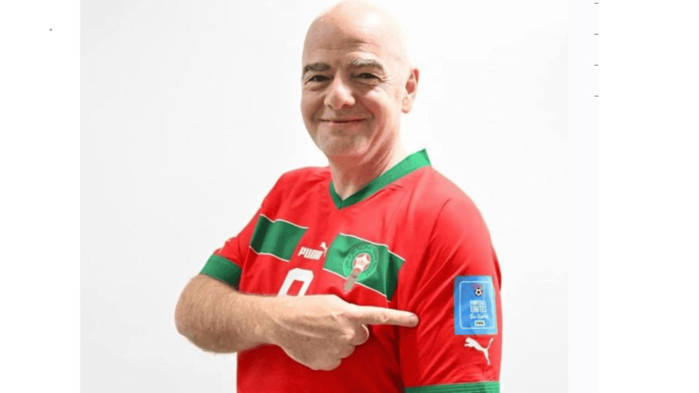 FIFA President Gianni Infantino acknowledging the achievements of Walid Regragui, former head coach of the Morocco national football team.