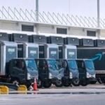 Amazon fulfillment center with packages, symbolizing logistics and shipping costs