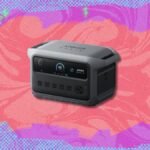 Anker Solix C2000 portable power station with its display showing charge level, ready for use.