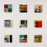 Barry Ginder's abstract plexiglass art showcasing urban landscapes and architectural designs.