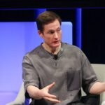 Beyond Biohacking: Bryan Johnson's Candid Confession on Sex Education 8 Bryan Johnson discussing his approach to sex education with his son, perhaps in a candid interview setting.