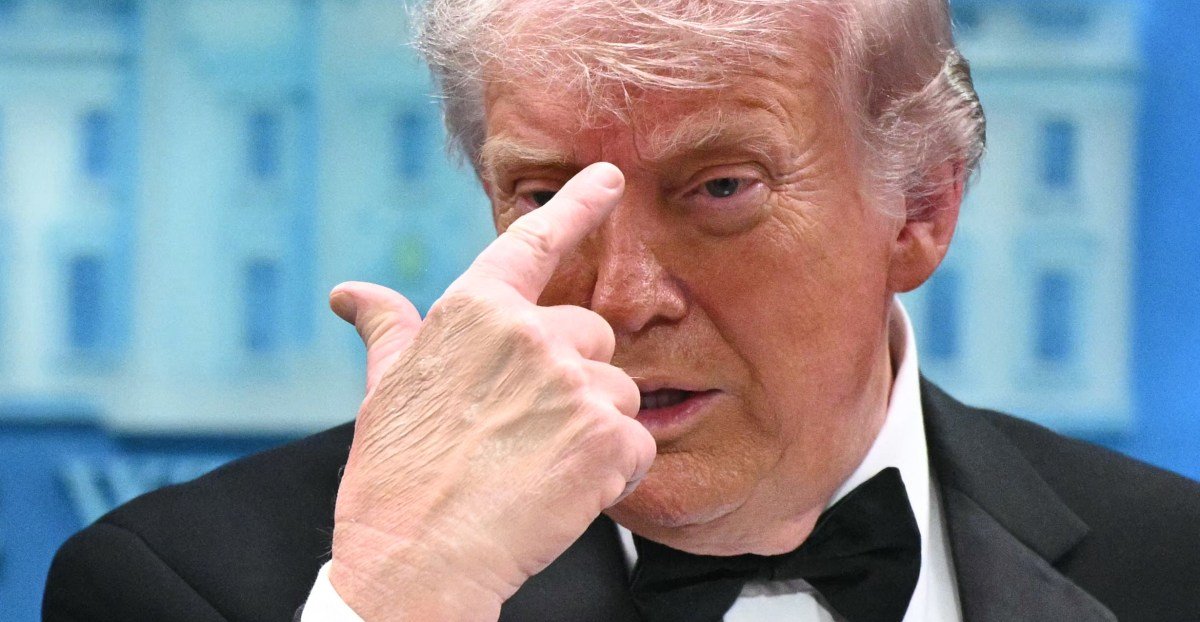 A person watching a conspiracy theory video on a smartphone, with social media logos in the background.