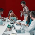 A leader calmly navigating a chaotic environment, symbolizing effective crisis management.