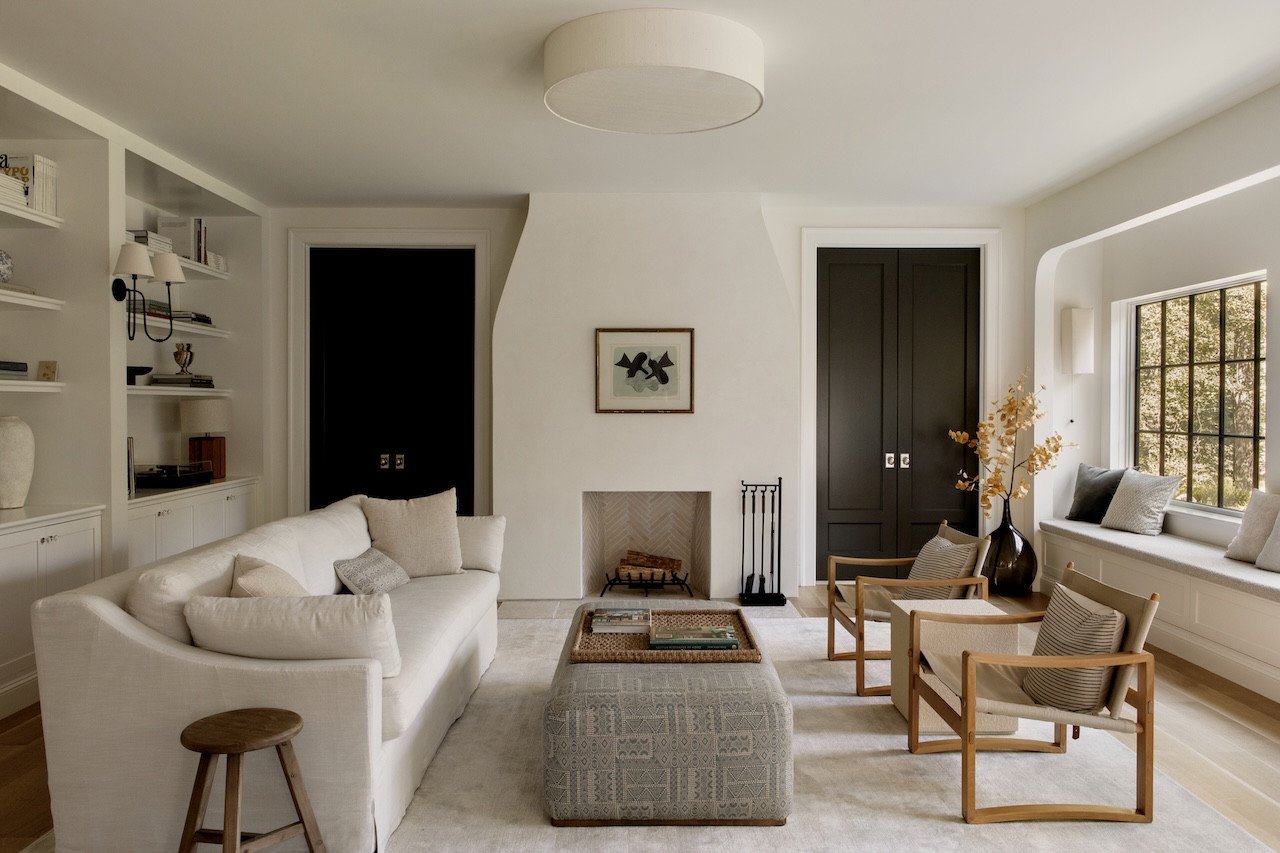 Bridging Eras: Ravi Raj's Masterful Revival of a Croton-on-Hudson Stone Residence 3 Exterior view of the renovated Croton-on-Hudson stone residence by Ravi Raj, showcasing the blend of original masonry and modern lap siding.