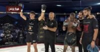 البطل المغربي شرف معطى الله يحمل حزام بطولة Honor Fight League بعد فوزه في كوراساو.